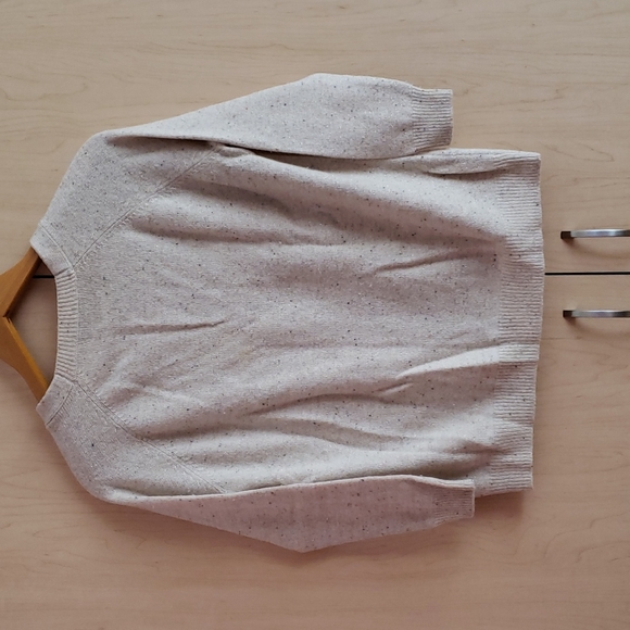 A cream colored long sleeve button-down cardigan with colored dots all around - Picture 2 of 6